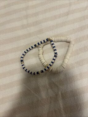 Stack of White and Blue Striped Bead Coil Bracelets